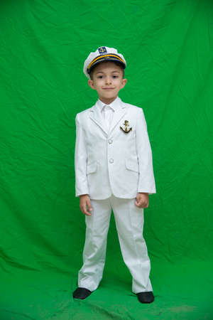Azerbaijan Baku 19.05.2019. Sailor child . The child was photographed in a white sailor suit. In the garden The child was photographed in a white sailor suit. In the gardenのeditorial素材