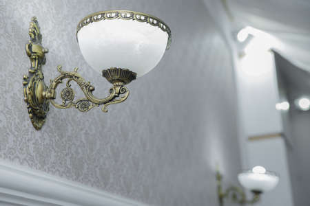 White old copper wall lamps . wall lamps White glass copper color iron lampの写真素材