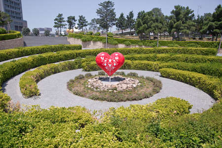Azerbaijan Baku 7.07.20202 . I love Baku's park. Model of a red heart . Big heart . A circular path to reach the heart . red hearts in a green parkのeditorial素材