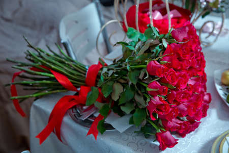 Big bouquet of one hundred big red roses flowers . A bouquet of flowers bouquet of a hundred red roses .の写真素材