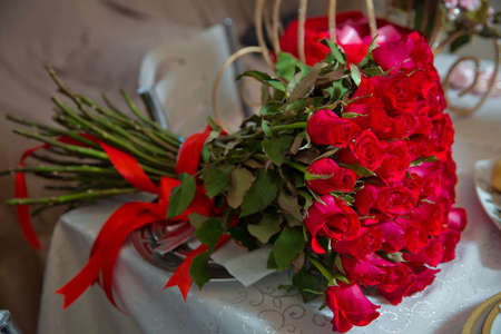 Big bouquet of one hundred big red roses flowers . A bouquet of flowers bouquet of a hundred red roses .の写真素材