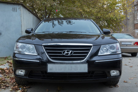 Azerbaijan , Baku . 16.12.2020 . Hyundai Sonata, 2.4 L, 2009 il .Black Car controller on steerling wheel ,Music,Control System Function and voice telephone in car. modern car interior .のeditorial素材
