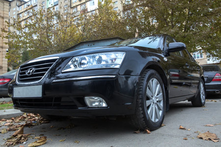 Azerbaijan , Baku . 16.12.2020 . Hyundai Sonata, 2.4 L, 2009 il .Black Car controller on steerling wheel ,Music,Control System Function and voice telephone in car. modern car interior .のeditorial素材