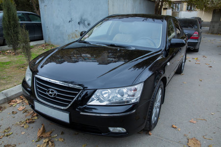 Azerbaijan , Baku . 16.12.2020 . Hyundai Sonata, 2.4 L, 2009 il .Black Car controller on steerling wheel ,Music,Control System Function and voice telephone in car. modern car interior .のeditorial素材