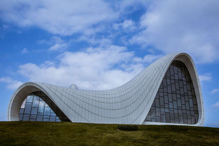 BAKU, AZERBAIJAN - 22.02.2021: Heydar Aliyev center, famous architectural landmark building in Baku by Zaha Hadid . Modern cultural center, which became a new symbol of Bakuのeditorial素材