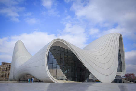 Heydar Aliyev center, famous architectural landmark building in Baku by Zaha Hadid . Modern cultural center, which became a new symbol of Baku . BAKU, AZERBAIJAN - 22.02.2021:のeditorial素材