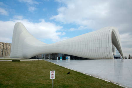 Heydar Aliyev center, famous architectural landmark building in Baku by Zaha Hadid . Modern cultural center, which became a new symbol of Baku . BAKU, AZERBAIJAN - 22.02.2021:のeditorial素材