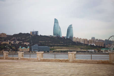 BAKU, AZERBAIJAN - 31.03.2021 : View from The Caspian Sea to Flame Towers. Baku Flame Towers is the tallest skyscraper in Baku, Azerbaijanのeditorial素材