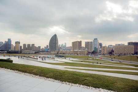 BAKU, AZERBAIJAN - 22.02.2021: Park of Heydar Aliyev Center in Baku. High-rise buildings. Panorama of Baku, the capital of the Republic of Azerbaijan from a high point of point of the city.のeditorial素材
