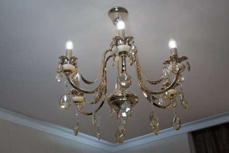 Retro antique ceiling light with crystal decoration. Elegant classic chandelier . Luxurious Vintage Chandelier in dark styleの写真素材
