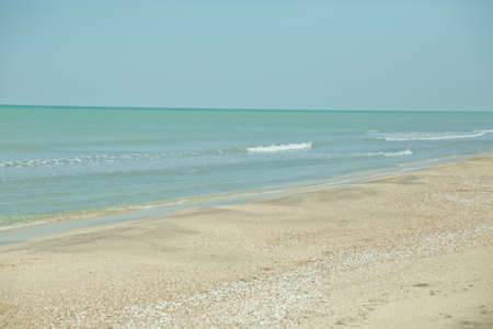 Crystal Clear Water, white sand beach, perfect at tanjung karang beach . blue sea and sky with beach...
