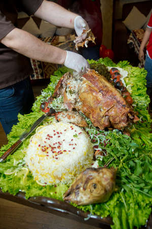 Roasted meat over an open fire, cooked in a special way.Barbecue is prepared of lamb or sheep meat and processed by slasher. pilaf . Many Cooking Traditional Azerbaijan asting lamb barbecues.の写真素材