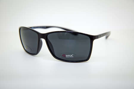 Black glasses on gray isolated white background . BENX MENS SUNGLASSES . Azerbaijan Baku . 24.04.2021 .のeditorial素材