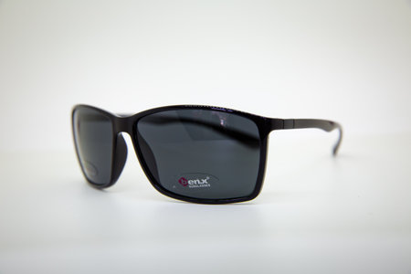 Azerbaijan Baku . 24.04.2021 . Black glasses on gray isolated white background . BENX MEN'S SUNGLASSES .のeditorial素材