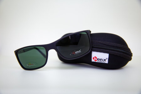 Azerbaijan Baku . 24.04.2021 . Black glasses on gray isolated white background . BENX MEN'S SUNGLASSES .のeditorial素材