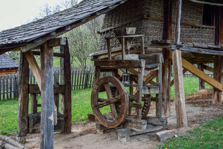 Old wooden corn millの写真素材