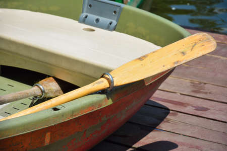 Part of a wood oar and boatの写真素材