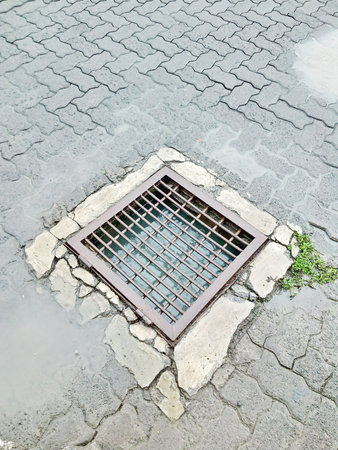 Drains with iron covers photoの写真素材