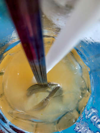 fresh orange ice in a glass photoの写真素材