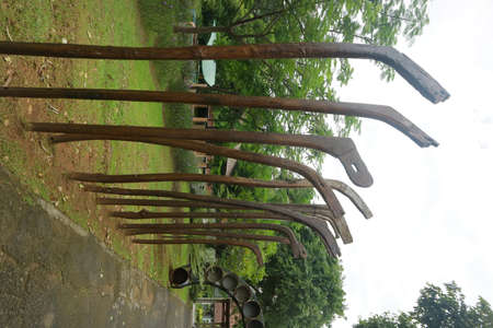 long wood arranged for decoration in a garden photoの写真素材