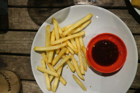 French fries on a white plate photo