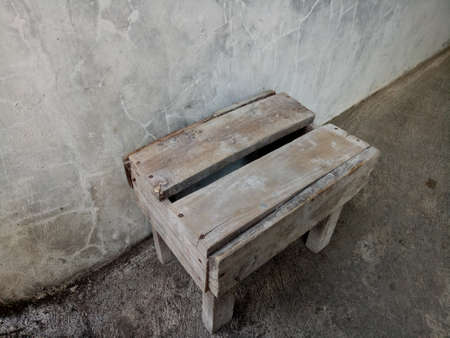 a photo of a simple small chair made of woodの写真素材