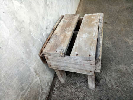 a photo of a simple small chair made of wood