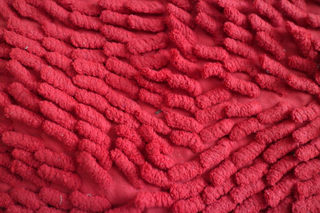 a photo of a the unique texture of the red matの写真素材