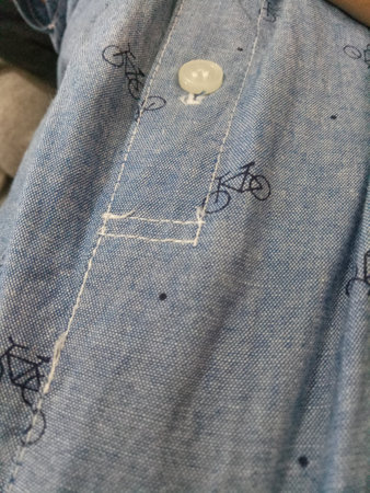 A Photo of a gray cloth texture with a bicycle image