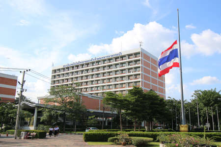 BANGKOK - OCTOBER 14: Thai government agencies nationwide were ordered to fly flags half-mast for 30 days on October 14, 2016 at King Mongkut's Institute of Technology Ladkrabang in Bangkok, Thailand.のeditorial素材