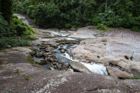Water Flows Through Rocks In a mountain stream at Phrom Lok Waterfall, Khao Luang National Park in Nakhon Si Thammarat, Thailand, Southeast Asiaの写真素材