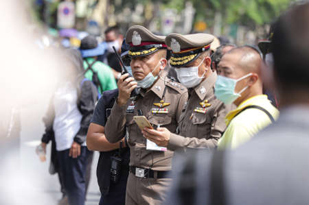 Bangkok, THAILAND - October 14, 2020: Chief police prepare for Pro-democracy demonstrators march during a Thai anti-government mass protest, on the 47th anniversary of the 1973 student uprising.のeditorial素材