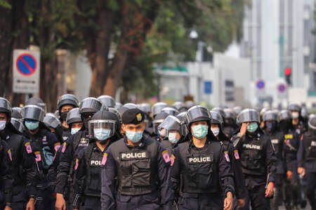 Bangkok, THAILAND - February 7, 2021: Thai Riot police take the area at front of UN Building from myanmar protesters in event against the military coup and free Aung San Suu Kyi.のeditorial素材