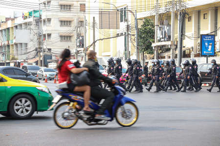 Bangkok, THAILAND - February 7, 2021: Thai Riot police take the area at front of UN Building from myanmar protesters in event against the military coup and free Aung San Suu Kyi.のeditorial素材