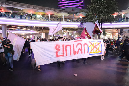 Bangkok, THAILAND - February 10, 2021: Pro-Democracy protesters arrived from Pathumwan Intersection to Phathumwan Police Station for call to release protesters after police arrest protesters today.のeditorial素材