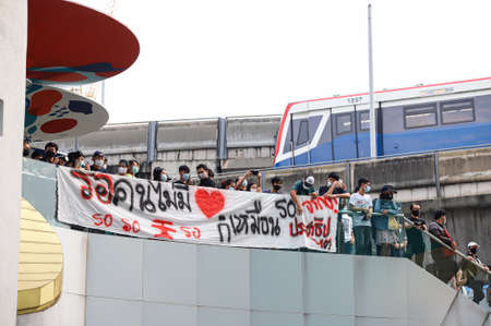Bangkok, THAILAND - February 10, 2021: Text at Skywalk Pathumwan Intersection by protesters is mean,...