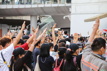 Bangkok, THAILAND - February 10, 2021: Pro-Democracy protesters protest at Pathumwan Intersection to hit the pot after the protesters not bailed out by the court the lese majeste case.のeditorial素材