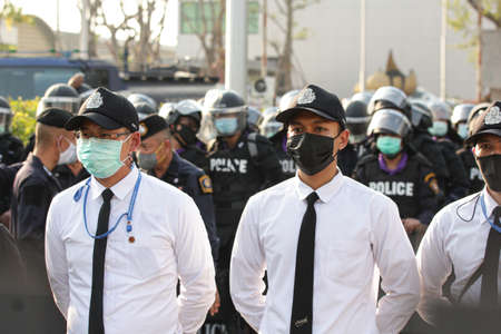 Bangkok, THAILAND - February 20, 2021: Parliamentary Police stand guard to protect...