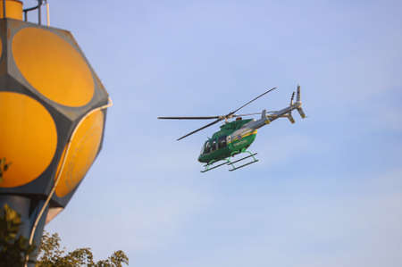 Songkhla, THAILAND - March 5, 2021: Bell 407GXP No. KASET-2322 form Thai Agricultural Aviation Division, Take off during Deputy Minister of Agriculture and Cooperative inspection program.のeditorial素材
