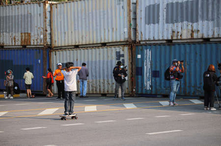 Bangkok, THAILAND - March 20, 2021: Protesters with Skateboard joined a Pro-democracy protests at Sanam Luang.のeditorial素材