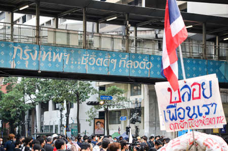 Bangkok, THAILAND - March 24, 2021: "Bangkok a place for the good life" Thai text over skywalk at Ratchaprasong intersection in protests for right to bail protesters leaders and monarchy reform.のeditorial素材