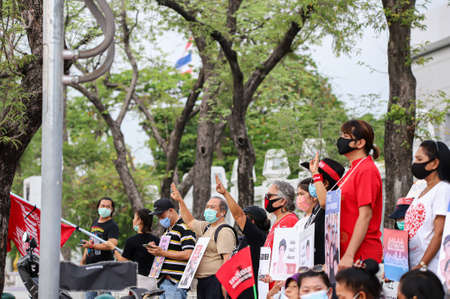 Bangkok, THAILAND - April 10, 2021: Pro-democracy protesters a three finger salute to show symbolic gestures and stand silently 112 minute for demand the release of protest leaders.のeditorial素材