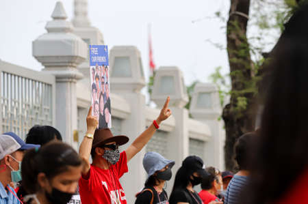 Bangkok, THAILAND - April 10, 2021: Pro-democracy protesters a three finger salute to show symbolic gestures and stand silently 112 minute for demand the release of protest leaders.のeditorial素材