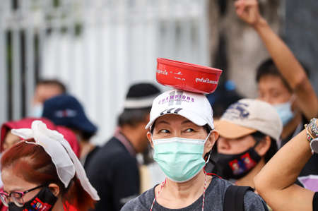 Bangkok, THAILAND - April 10, 2021: Resistant citizen protesters group stand silently 112 minute for protest Justice and demand the release of protest leaders at front of the Supreme Court.のeditorial素材