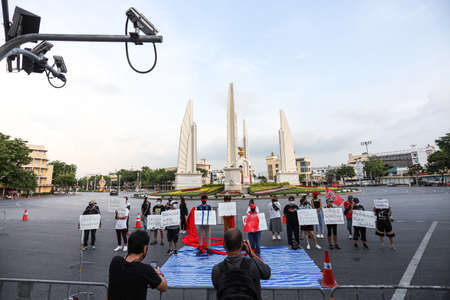 Bangkok, THAILAND - May 2, 2021: Coalition of Salaya for Democracy stand silently 112 minute at...
