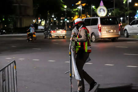 Bangkok, THAILAND - May 2, 2021: Traffic Police clear the road area after event stand silently 112 minute by Coalition of Salaya for Democracy.のeditorial素材