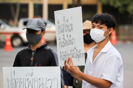 Bangkok, THAILAND - May 2, 2021: Coalition of Salaya for Democracy stand silently 112 minute at Democracy Monument for protest the Justice and demand the release of protest leaders.のeditorial素材