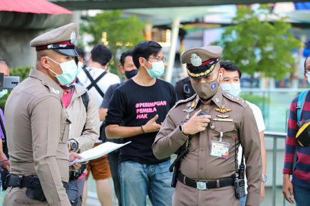 Bangkok, THAILAND - May 10, 2021: Superintendent Pathumwan Metropolitan Police station talk to...