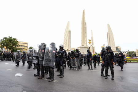 Bangkok, THAILAND - August 7, 2021: Riot police take control area around the Democracy Monument before Pro-democracy protesters gather, But they protesters change gather point to Victory Monument.のeditorial素材