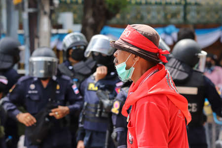 Bangkok, THAILAND - August 7, 2021: Riot police take control area around the Democracy Monument before Pro-democracy protesters gather, But they protesters change gather point to Victory Monument.のeditorial素材